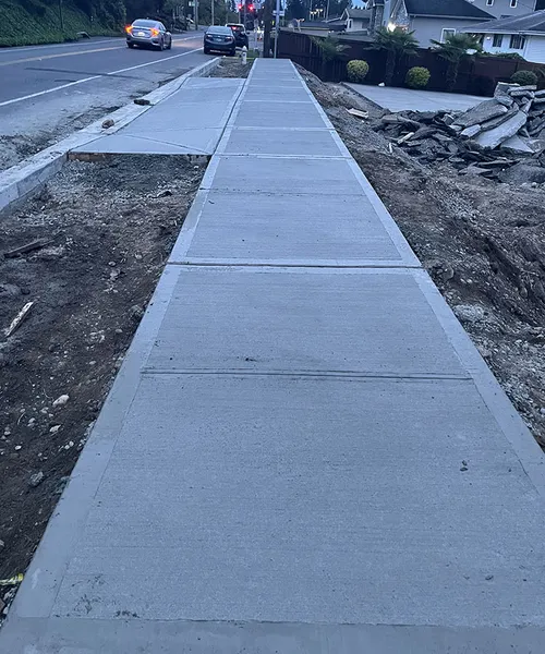 Sidewalk & curb gather concrete in Renton 